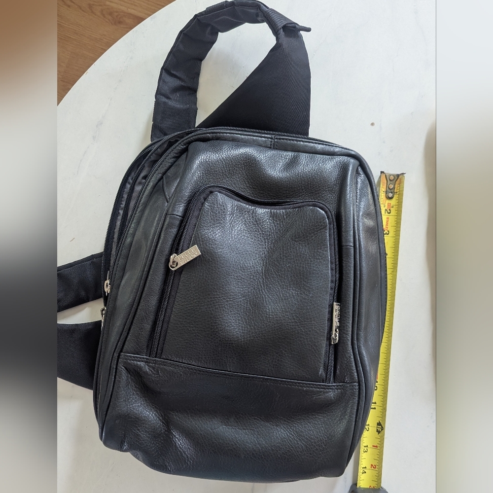 Black Backpack with Sleek Design and Glossy Finish